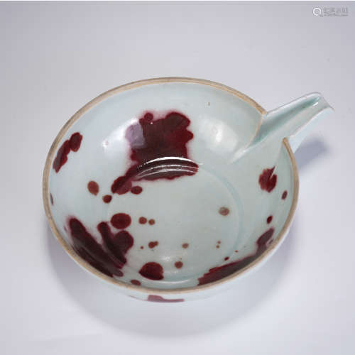 A CHINESE RED UNDER GLAZE PORCLEAIN POURING BOWL