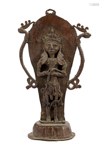 Bronze divine person standing on altar