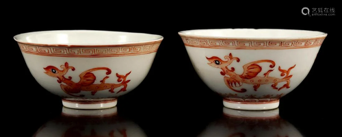 2 porcelain bowls decorated with dragons