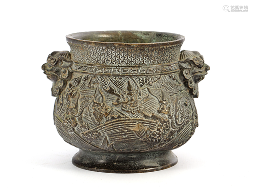 Metal pot with relief decoration and ears