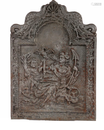 Cast iron fireback with relief decoration