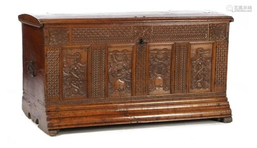 Oak blanket chest with richly decorated decor in front