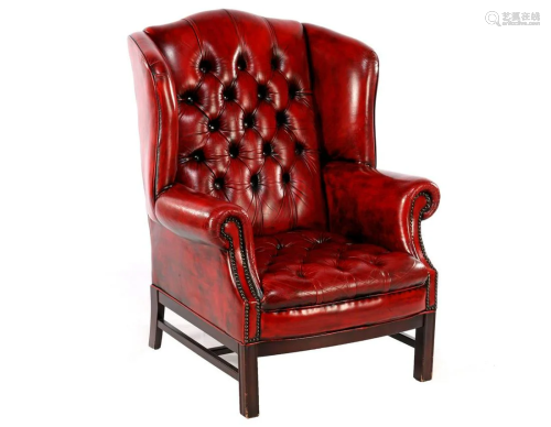 Leather wing chair with red leather