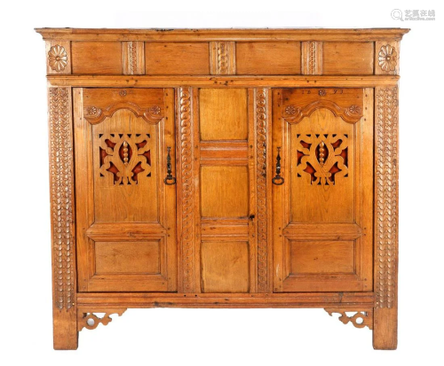Antique oak cabinet with richly carved dÃ©cor