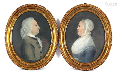 2 oval portraits of man and woman