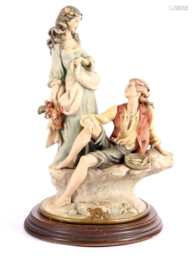 Porcelain statue of a romantic couple, signed Giuseppe