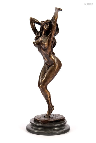 Decorative bronze sculpture of a standing nude woman