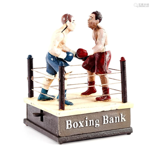 Cast iron money box as a boxing ring with boxers