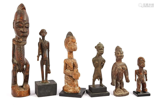 4 African tribal wooden bombarded figurines