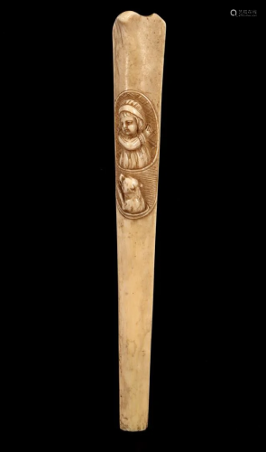 Richly carved bone handle for a parasol decorated with
