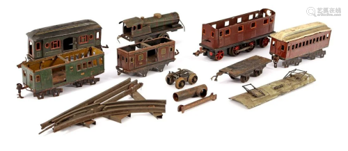 Lot of old tin locomotives and wagons