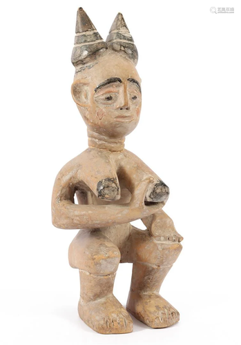 African tribal wooden bombarded and painted fertility