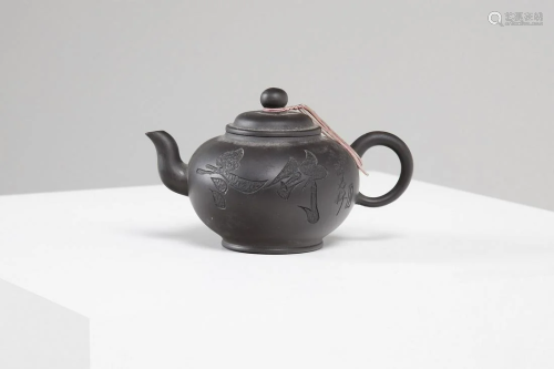 Arte Cinese A pottery Yixing teapot China, 20th