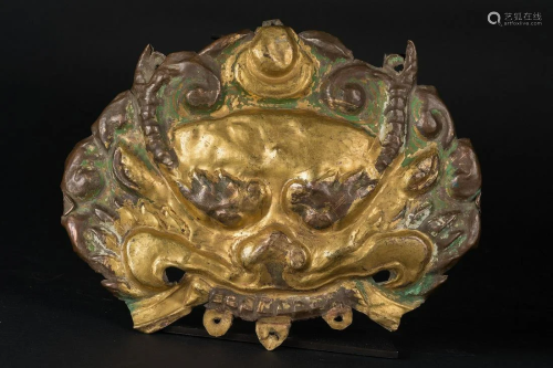 Arte Himalayana An embossed gilt bronze Cheppu with