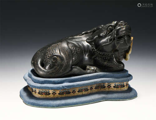 A CHINESE JADE CARVING OF MYTHICAL ANIMAL