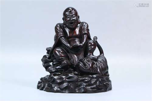 A Chinese Carved Hardwood Figure of Buddha