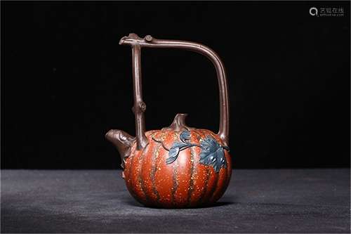 A Chinese Carved Yixing Clay Teapot