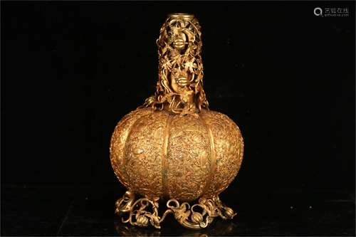 A Chinese Gilt Bronze Candlestick