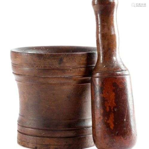 A TREEN WALNUT PESTLE AND MORTAR EARLY 18TH CENTUR…