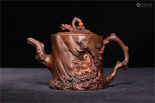 A Chinese Carved Yixing Clay Teapot