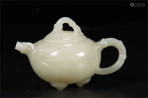 A Chinese Carved Jade Teapot