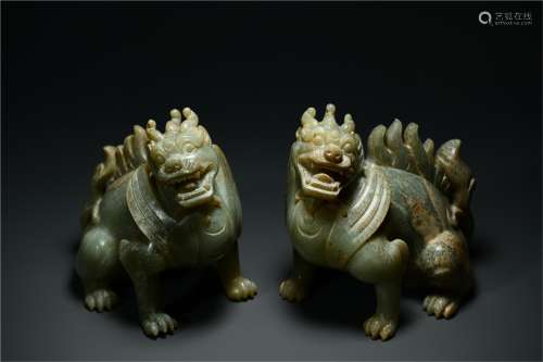 A Pair of Chinese Carved Jade Decorations