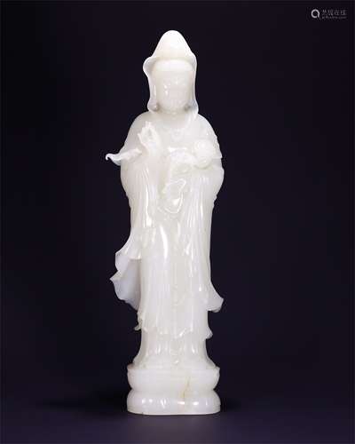 A Chinese Carved Jade Figure of Buddha