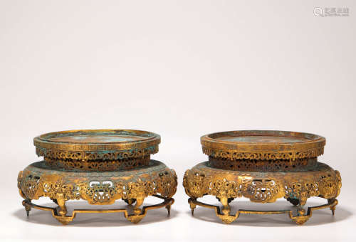 A pair of copper and gilding holders from Qing清代銅鎏金底托一對