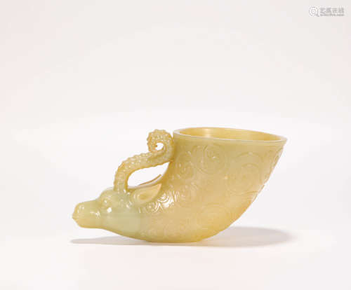 Hetian jade cup in ox horn form from Tang唐代和田玉牛首爵杯