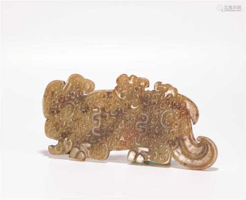 Hetian jade ornament in tiger form from Han漢代和田玉虎形壁