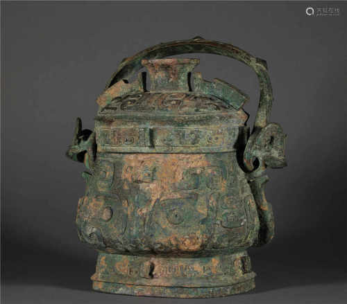 Bronze kettle with a handgrip from Shang and Zhou商周青銅提梁容器