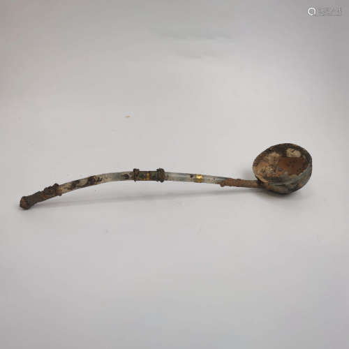 AN AGATE INLAID BRONZE SPOON