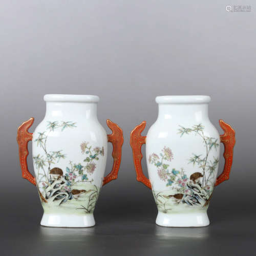 A PAIR OF FLORAL DOUBLE-EARED PORCELAIN VASES