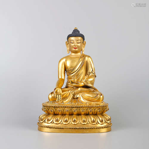 A GILT-BRONZE BUDDHA STATUE OF SHAKYAMUNI