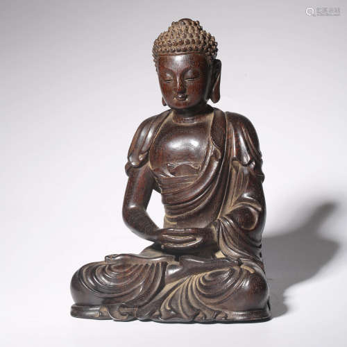 A RED SANDALWOOD SEATED BUDDHA STATUE