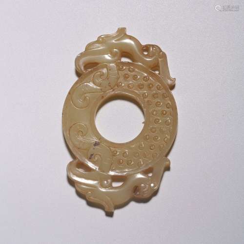 A PHOENIX CARVED JADE BI