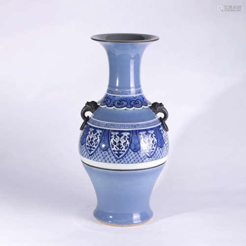 A BLUE GLAZED BLUE AND WHITE FLORAL DOUBLE-EARED PORCELAIN VASE