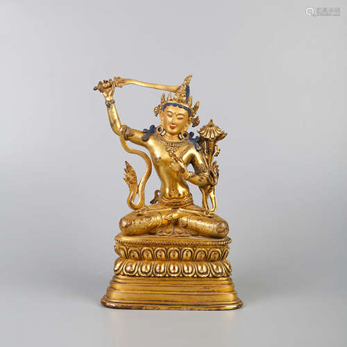 A GILT-BRONZE STATUE OF MANJUSRI BODHISATTVA