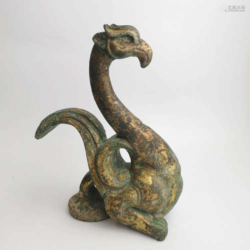 A GILT-BRONZE BEAST BIRD ORNAMENT