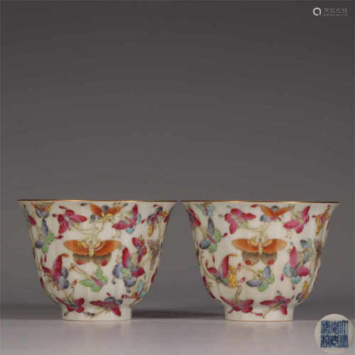A pair of famille rose one hundred butterfly cups