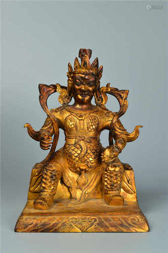 A gilded bronze of guan figure