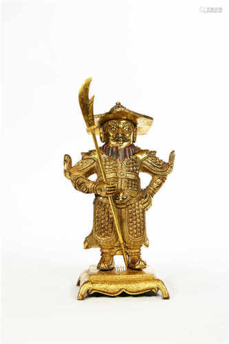 A gilded bronze zhoucang figure