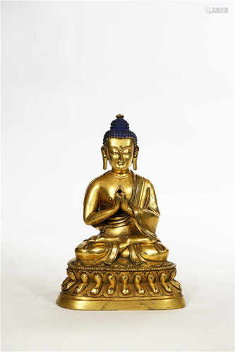 A gilded bronze Shakyamuni buddha statue