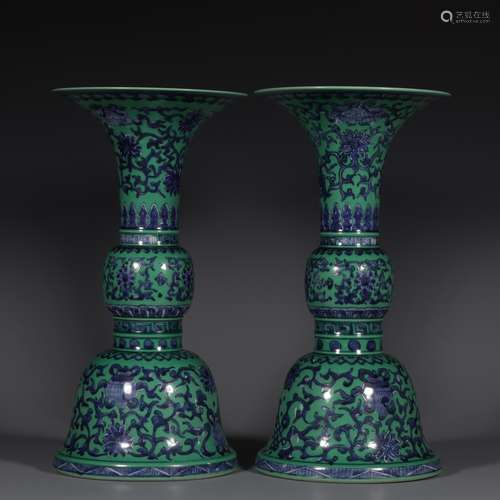 A pair of eight treasures vases