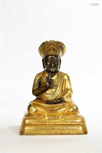 A gilded bronze buddha statue