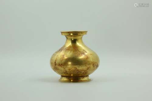 A gold vase