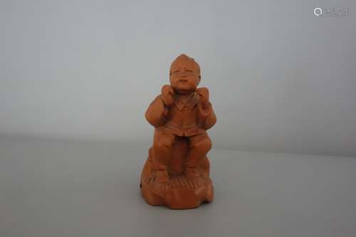 A boxwood figure