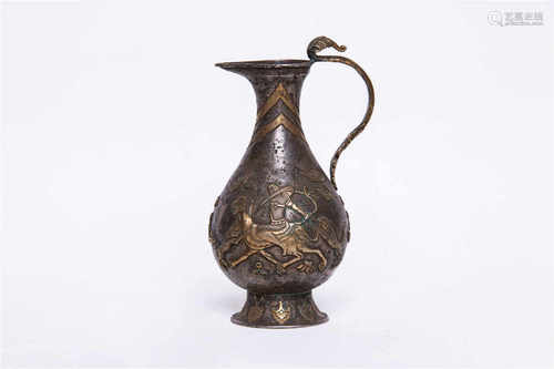 A silver wine pot