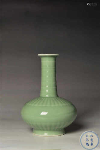 A Yongzheng celdon glazed tianqiu vase