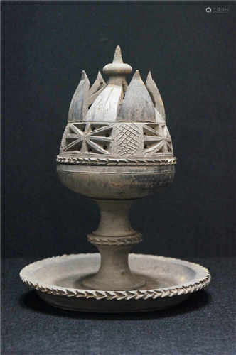 A black pottery incense burner